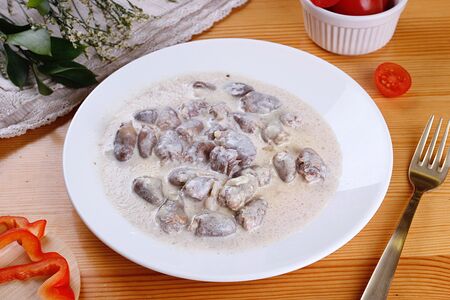 Куриные сердечки в сливочном соусе