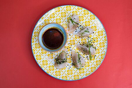 Димсам с гребешком и беконом