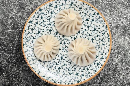 Хинкали с лососем и шпинатом