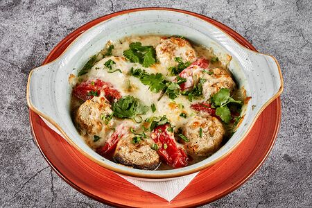 Шампиньоны, запеченные с томатами