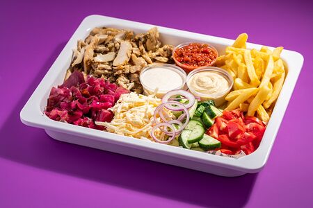 Шаверма Макси на тарелке с картофелем фри