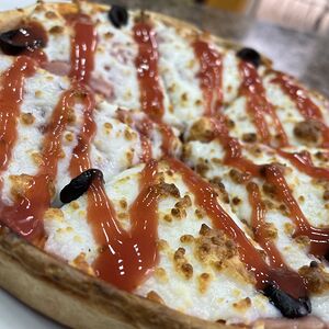 Пицца с ветчиной маленькая