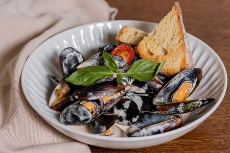 Мидии в сливочном соусе