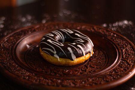 Донат шоколадный