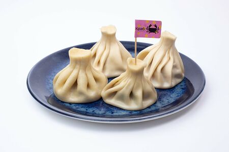 Хинкали с камчатским крабом и сливками