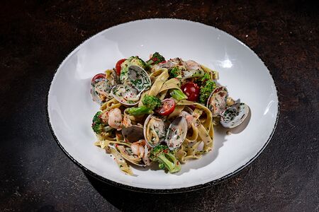 Моллюски в сливочном соусе