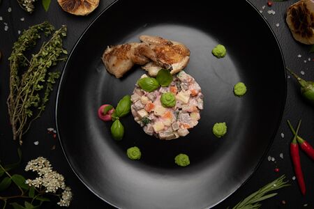 Оливье с языком и перепелом