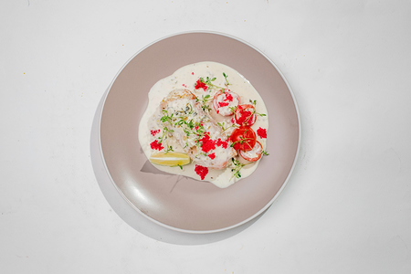 Фаршированный кальмар в сливочном соусе