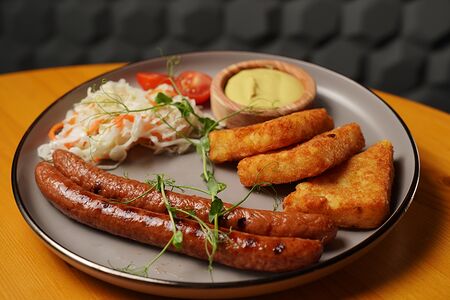 Колбаски жареные