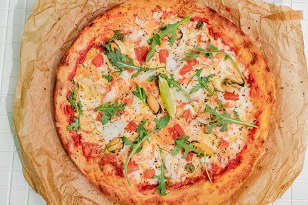 Пицца Сливочно-томатная с морепродуктами