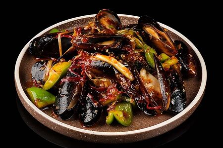 Мидии в сладко-чесночном соусе