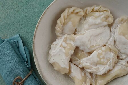 Вареники ручной лепки с творогом и ванильным соусом