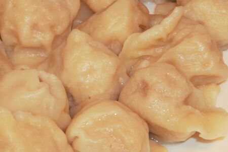 Пельмени со свининой и пекинской капустой