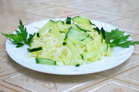 Салат из свежей капусты с огурцом