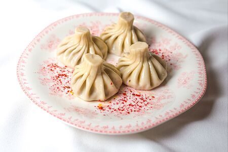 Хинкали с сыром сулугуни и страчателлой