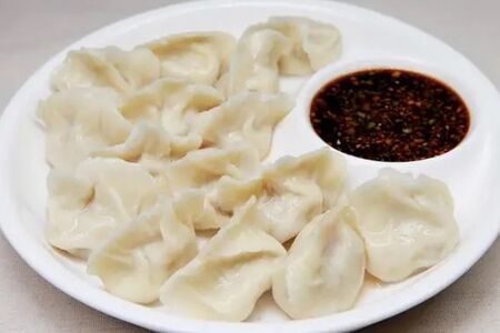 Пельмени со свининой и капустой