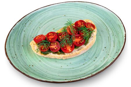 Брускетта с томатами черри и фирменным соусом песто