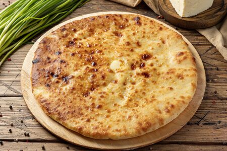 Осетинский пирог с сыром и зеленым луком
