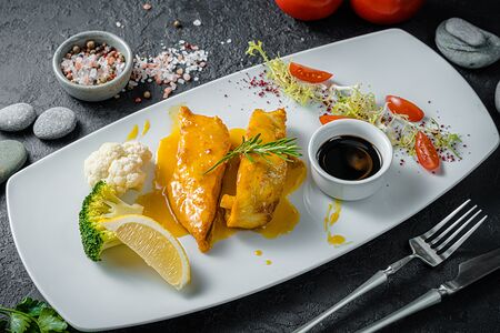 Осетрина в апельсиново-лимонном соусе