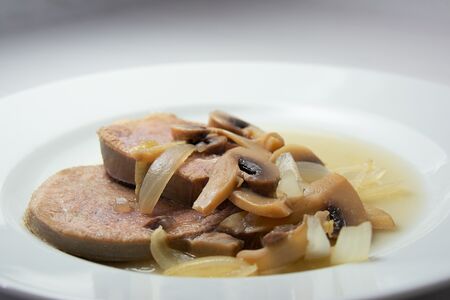 Говяжий язык в грибном соусе