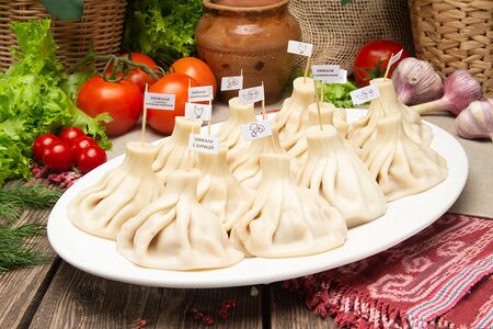 Хинкали с семгой и тигровыми креветками